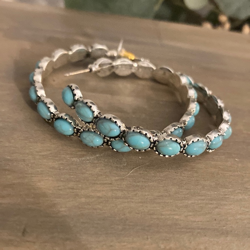 Turquoise colored hoops
